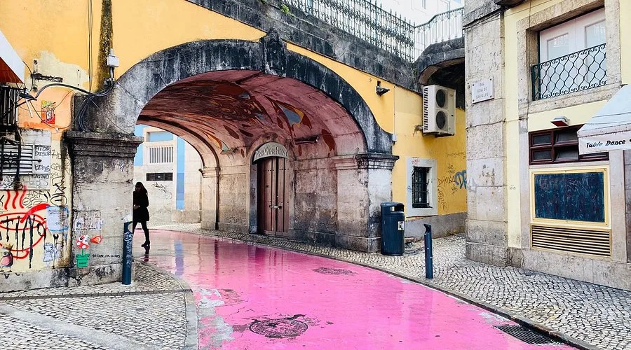 A vibrant Lisbon street with colourful cafés and hipster markets